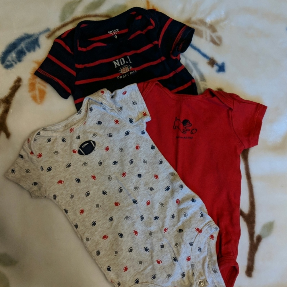 Carter's football onesies